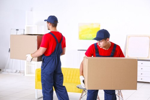 Same day removals team loading furniture in Croydon