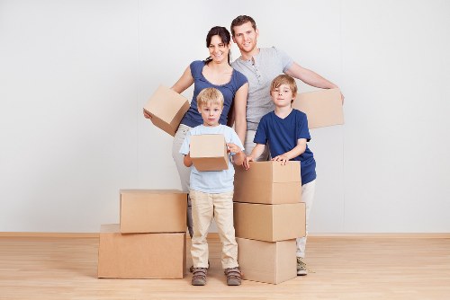 Croydon apartment moving team managing boxes and furniture in a residential block