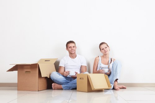 Packed moving boxes and furniture ready for transport in Croydon