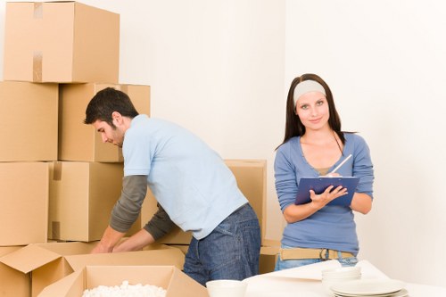 Packed moving boxes and equipment secured for transit
