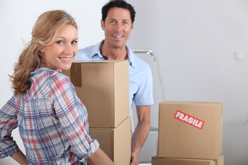 Wardrobe boxes and labelled moving cartons in Croydon