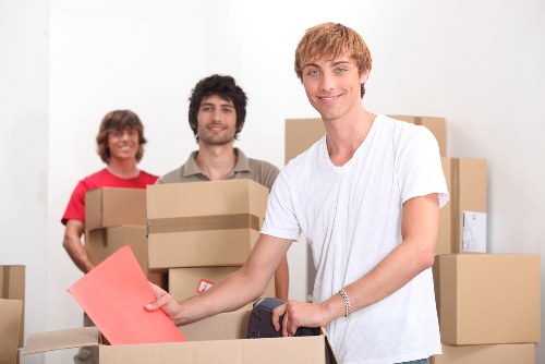 Professional movers handling furniture during a Croydon home relocation